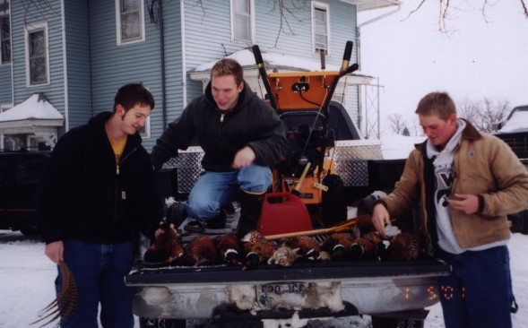 Josh and his friends with a good day pheasat hunting.